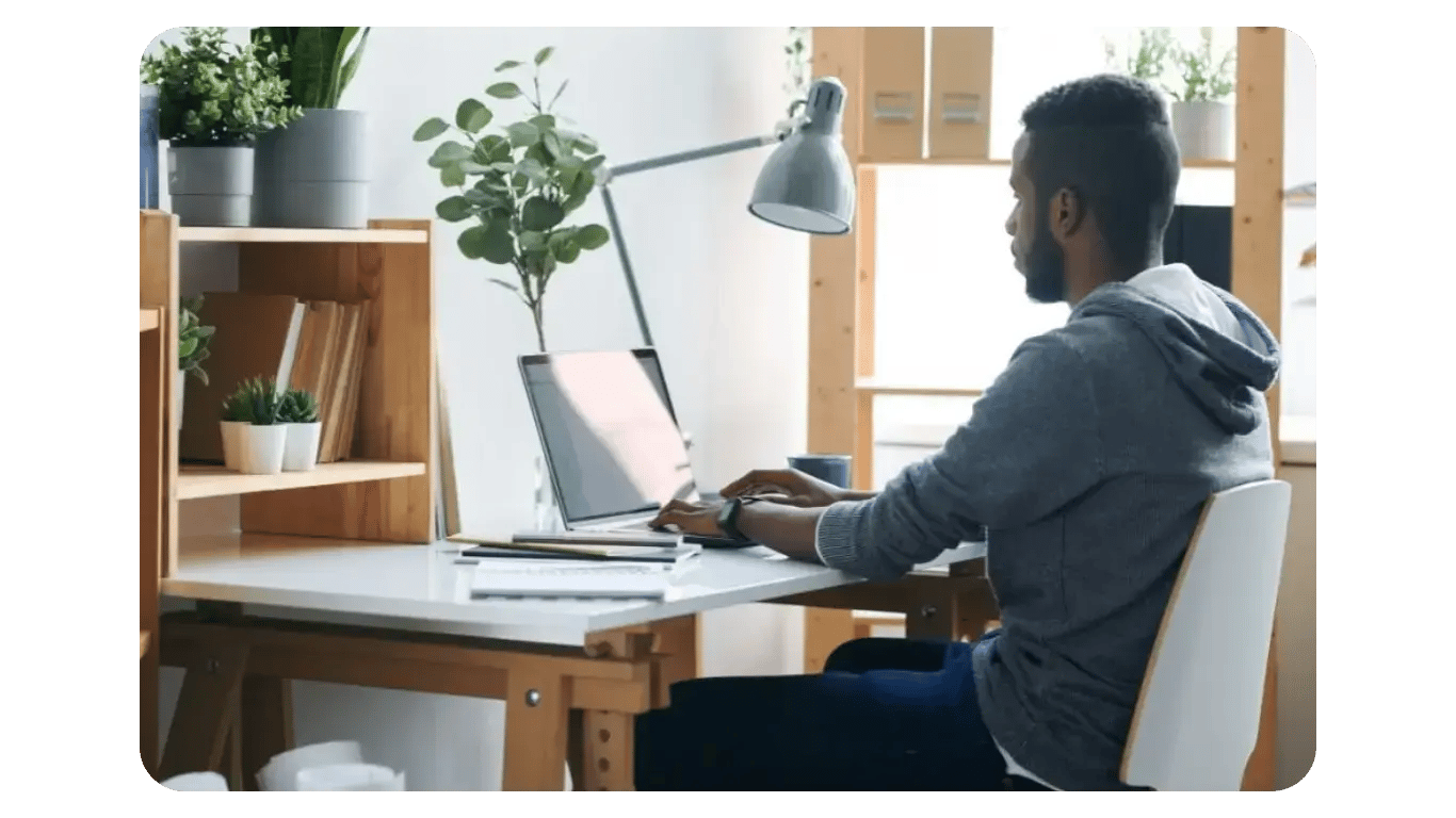 man working on computer hero image